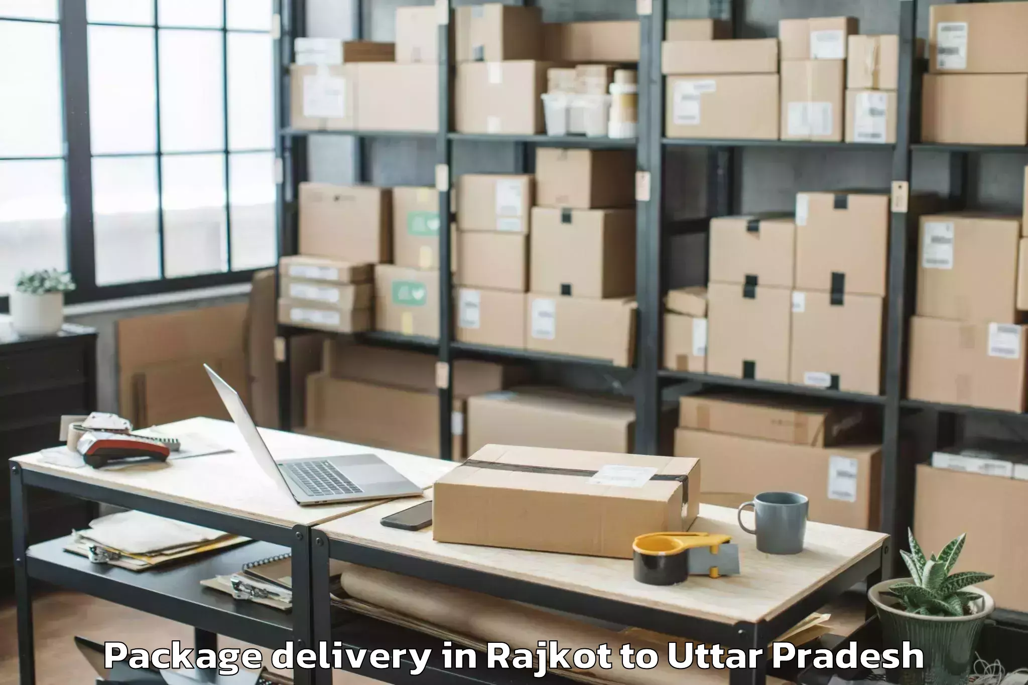 Reliable Rajkot to Manjhanpur Package Delivery